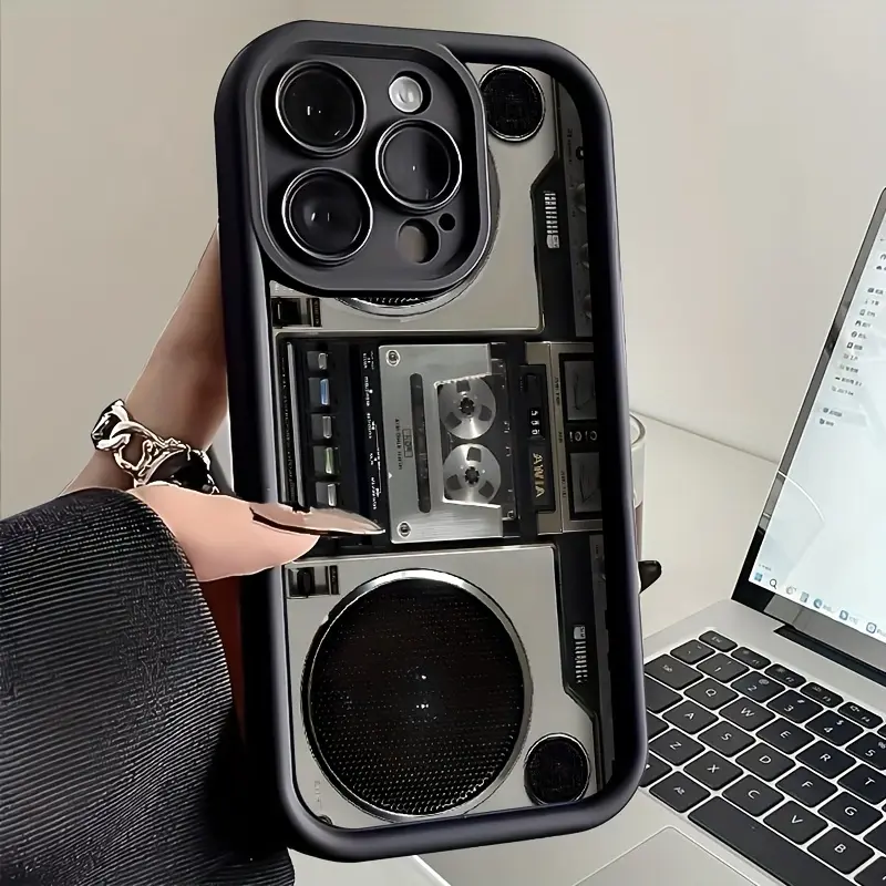 Own-store catalog photograph showing the Vintage Boombox Cassette Phone Case with speaker and cassette imagery.